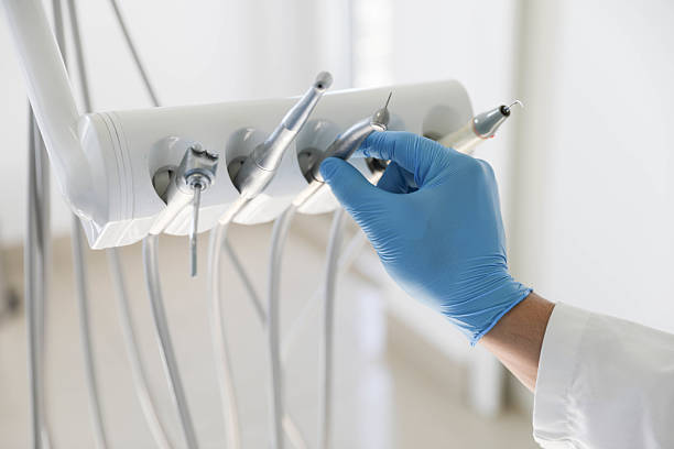 Professional Emergency Dentist technician working in Tulsa, OK